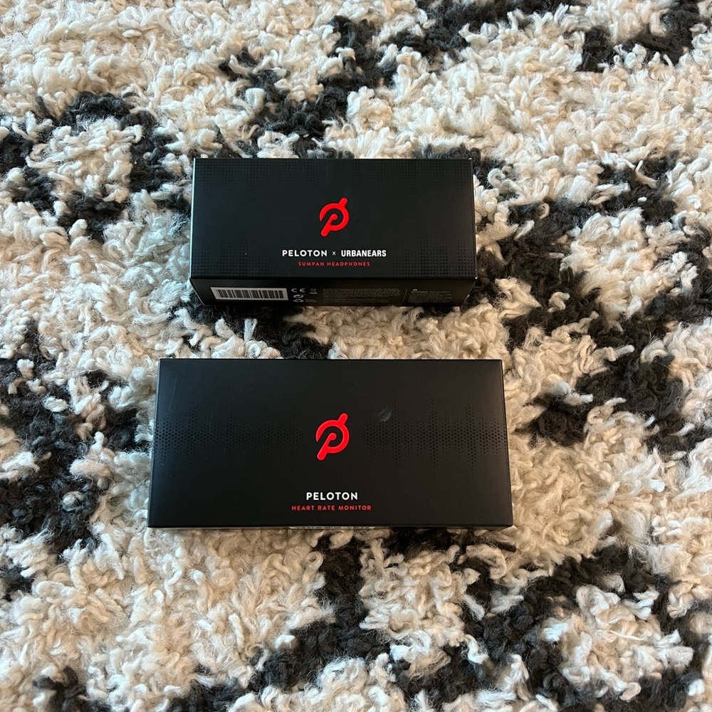 Peloton headphones and heart monitor